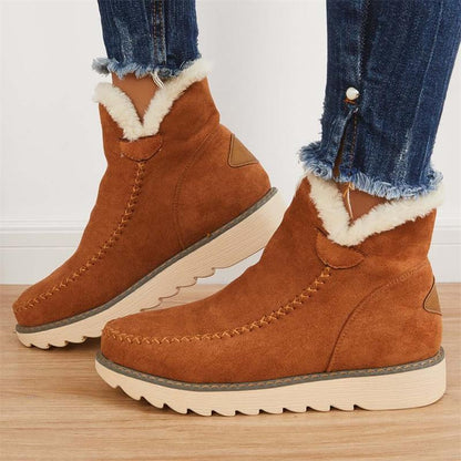 Paire de bottines pour femme adaptée aux tenues d’hiver