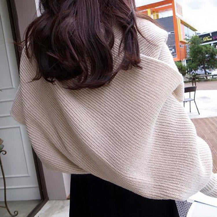 Vue rapprochée de la maille structurée de l’écharpe femme