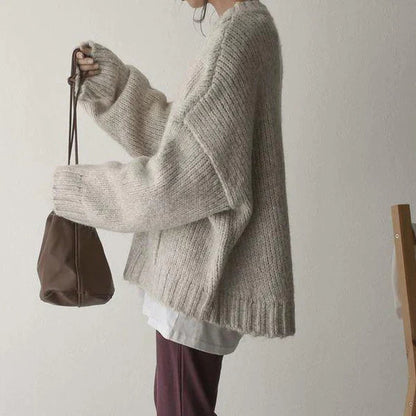 Détail de la poche frontale du pull femme oversize