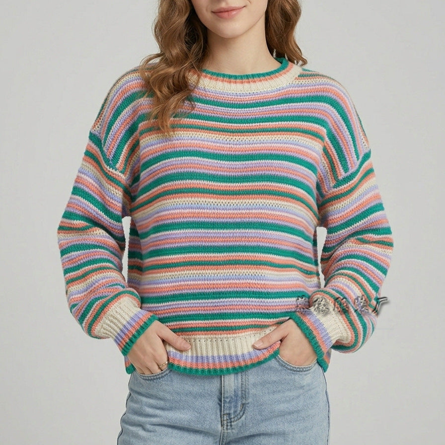 Vue rapprochée des rayures et de la texture en maille du pull