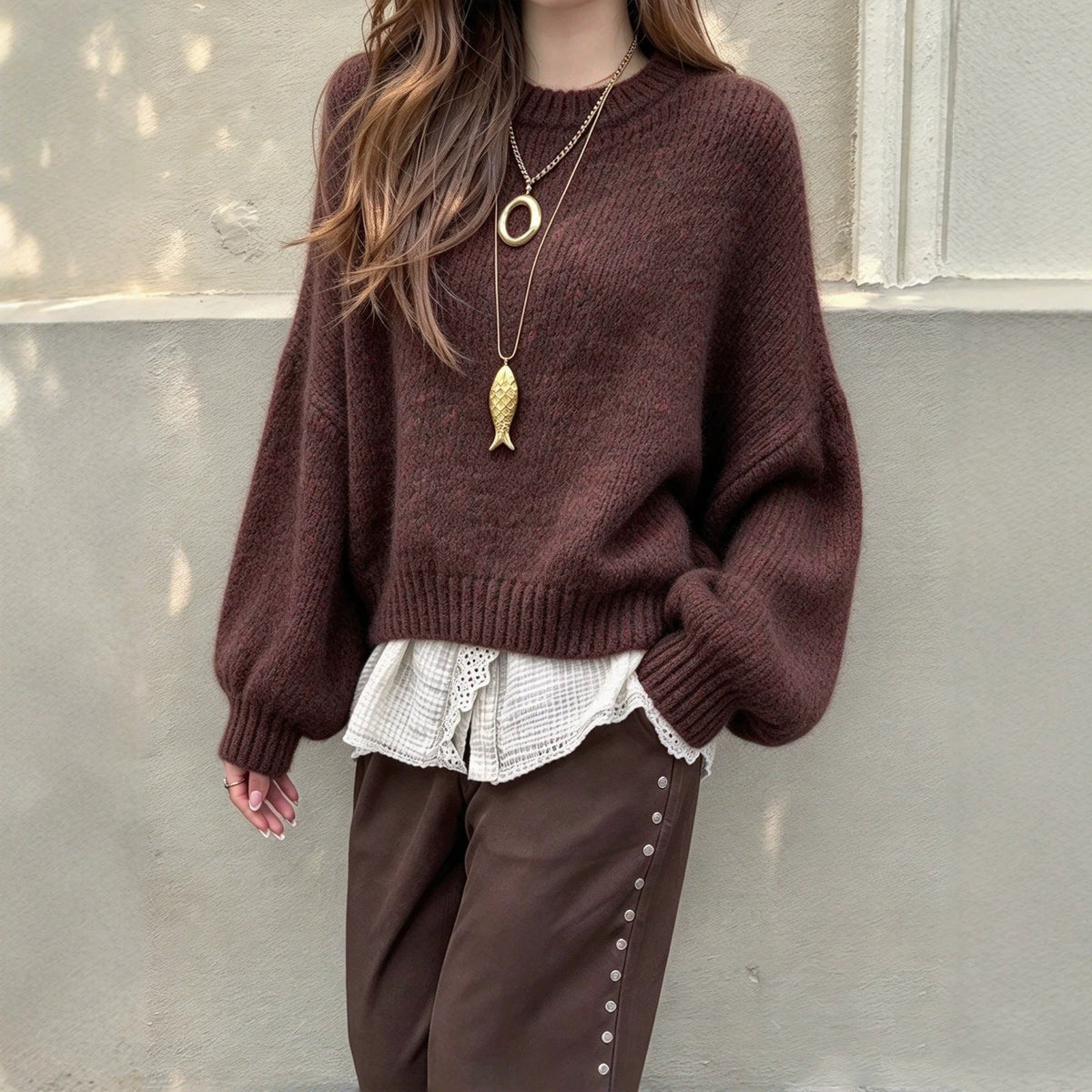 Pull femme rétro à manches lanterne présenté de face