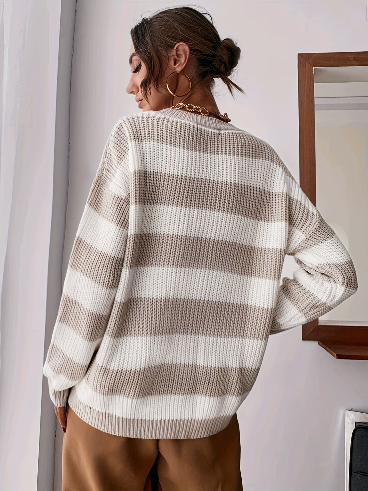 Pull rayé pour femme présenté de face