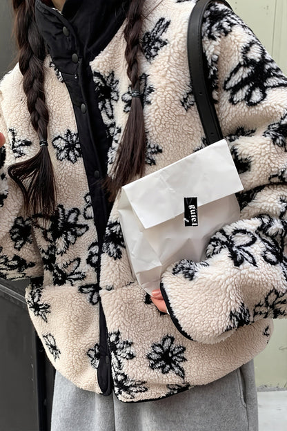 Vue de face du manteau femme réversible à col confortable