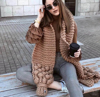 Texture tricotée et finitions de l’écharpe femme
