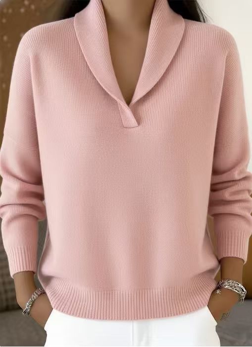 Détail des manches et des finitions du pull en maille