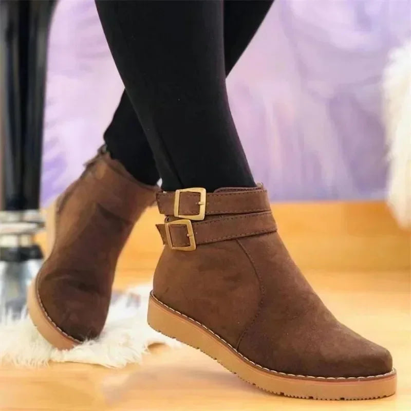 Bottes femme montantes à semelle plate, vue de profil