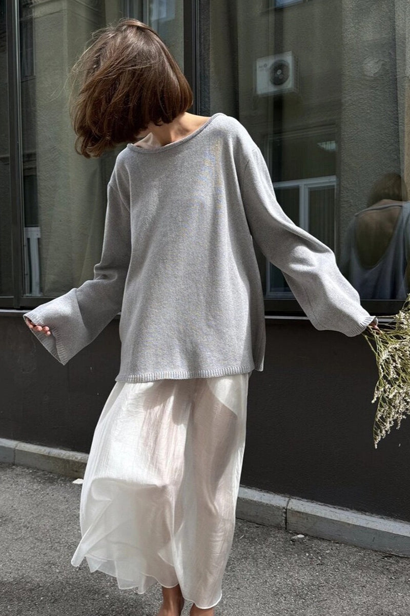 Pull femme à manches longues et dos ouvert
