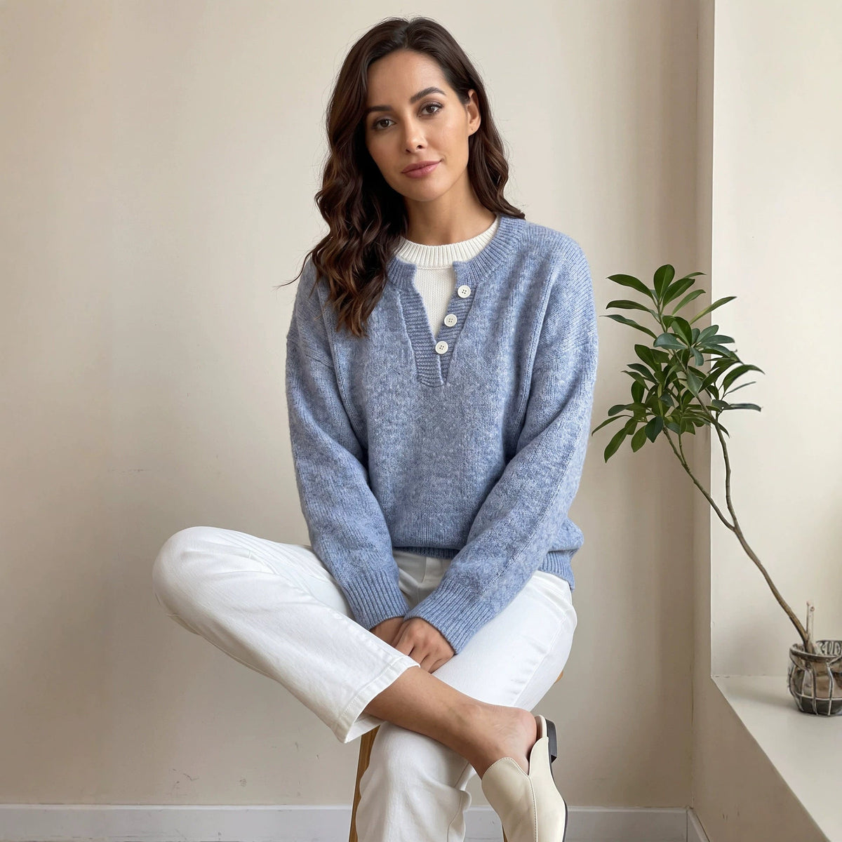 Vue de face du pull femme en maille à col demi-zip