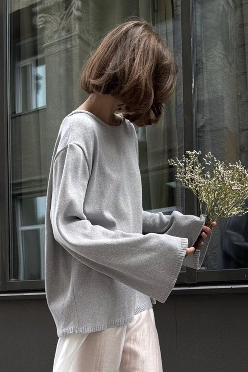 Vue arrière du pull femme montrant son dos ouvert