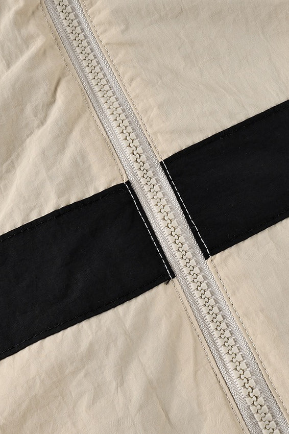 Vue arrière d’une veste femme courte à design bicolore