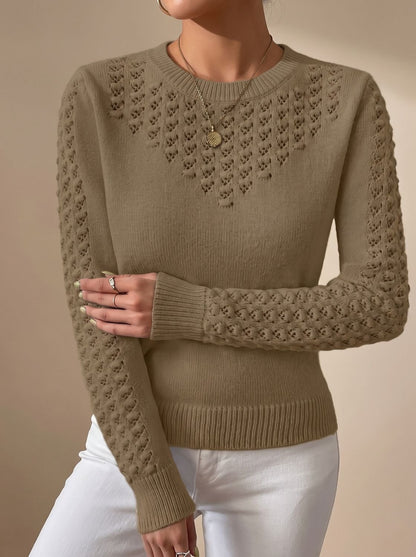 Vue rapprochée de la maille pointelle du pull femme