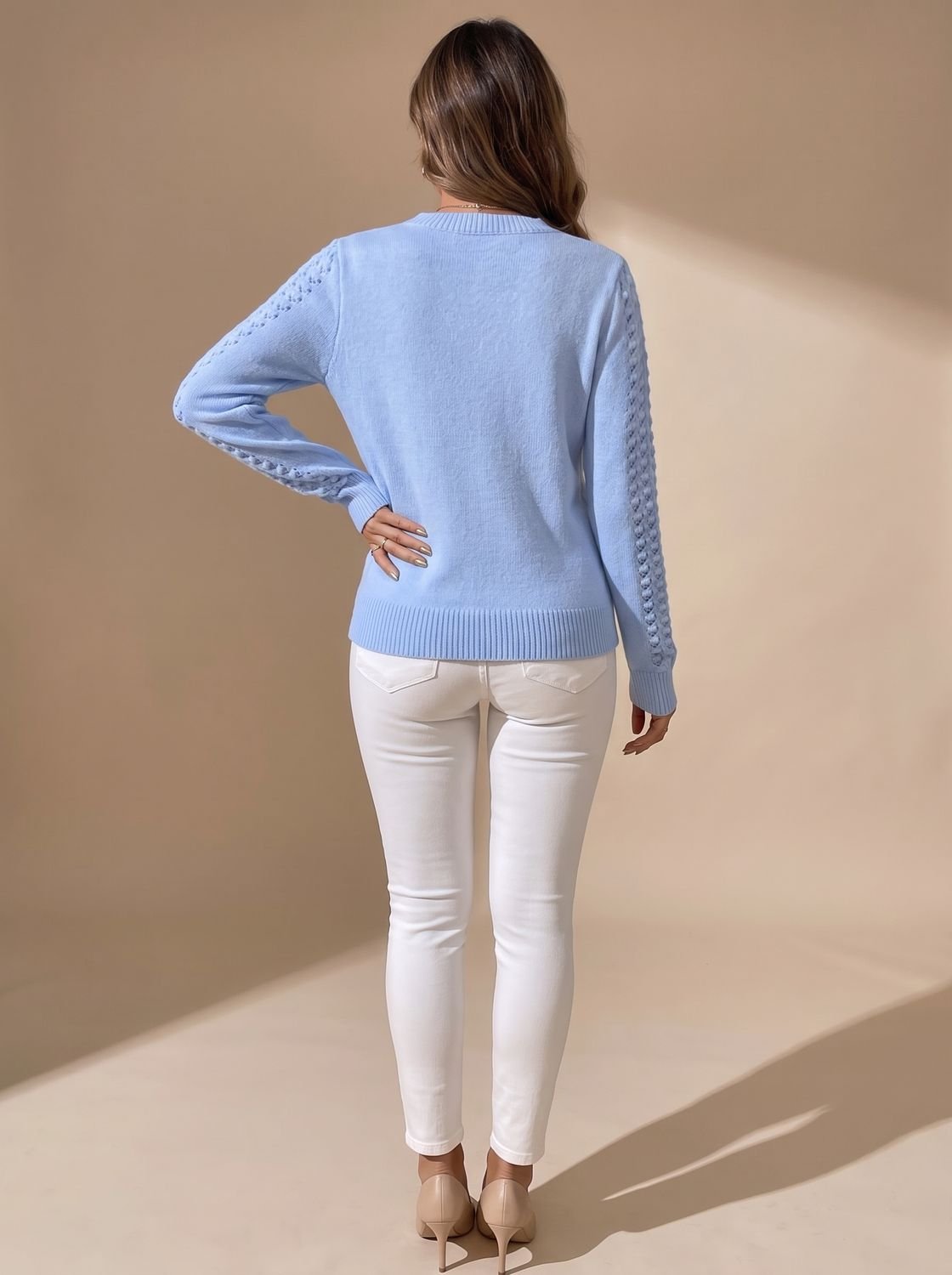 Vue de dos du pull femme court en maille