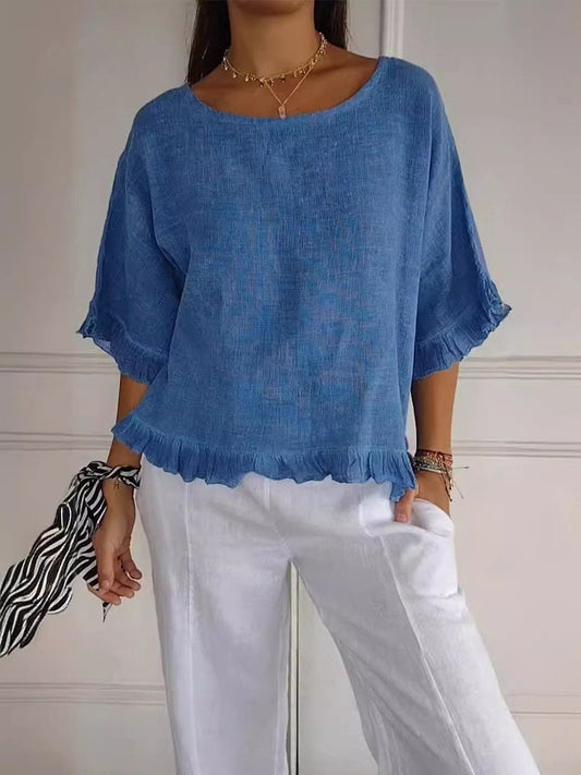 Blouse femme fluide à ourlet à franges, présentée de face