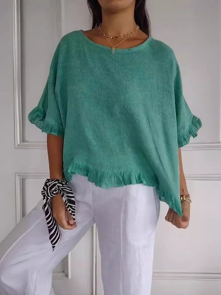 Zoom sur la matière aspect lin de la blouse femme